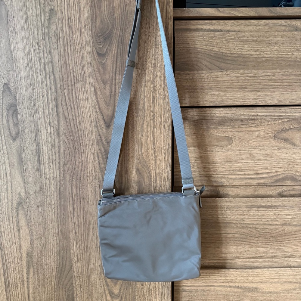 Tumi voyageur tula crossbody bag